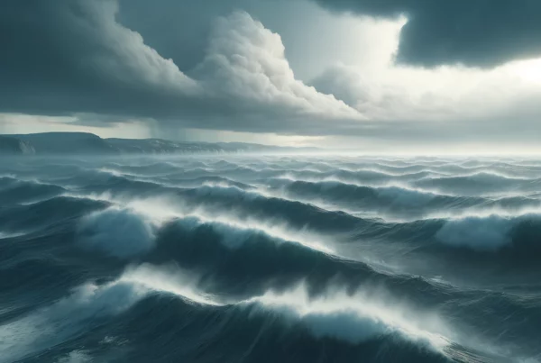 A realistic image of the North Atlantic Ocean during a hurricane with the coast of Newfoundland visible on the horizon. The waves are moderately large, crashing gently against each other under an overcast sky. The clouds are thick and grey, with light rain falling. The ocean's surface is rough but not overly dramatic, with whitecaps visible on the waves. The coastline of Newfoundland is seen in the distance, adding a sense of location to the scene while maintaining a realistic and calm atmosphere.