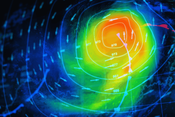 Heat map style weather graphic showing an intense storm system over Newfoundland and Labrador, with colour bands, pressure lines, and wind arrows illustrating rising severe weather risks impacting small businesses.